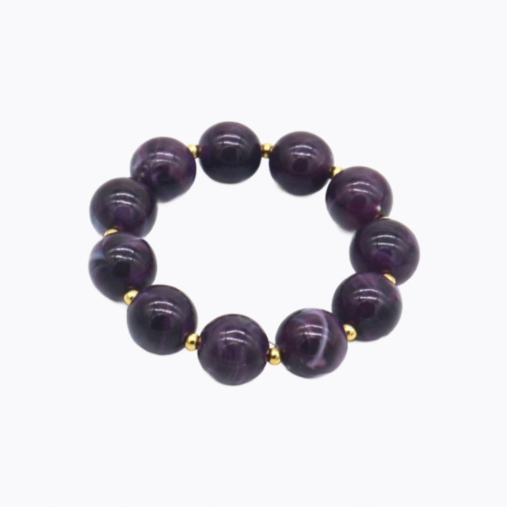 Bracelet élastique fabriqué en acier inoxydable de haute qualité et orné de perles acryliques