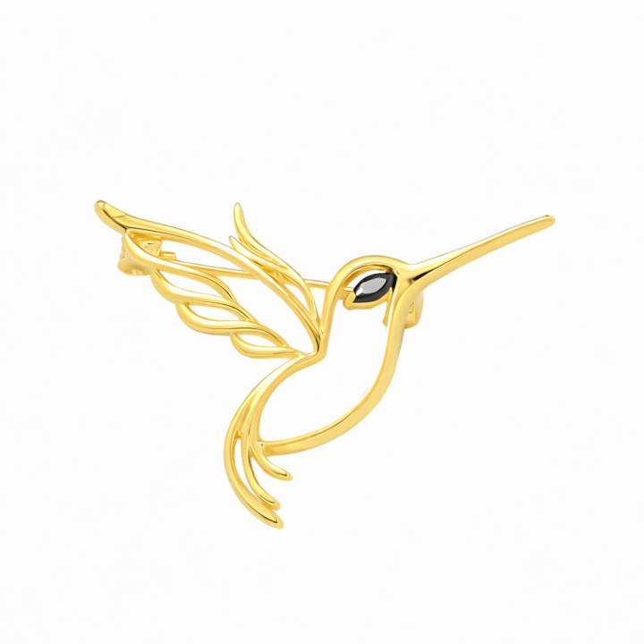 Broche élégante en forme d'oiseau ajouré avec plumes dorées et œil en pierre noire