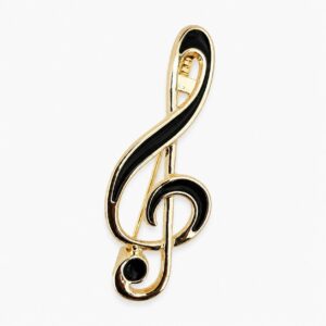 Broche clé de sol dorée noire