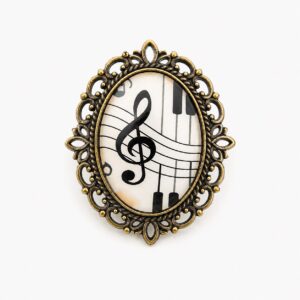 Broche avec une clé de Sol - Ovale en verre avec bordure en dentelle